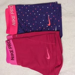 2 pair of Nike Pro shorts size medium